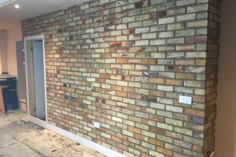 Rustic look Interior wall with brick slips.